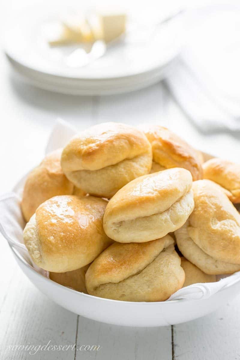 a bowl of warm Parker House Rolls