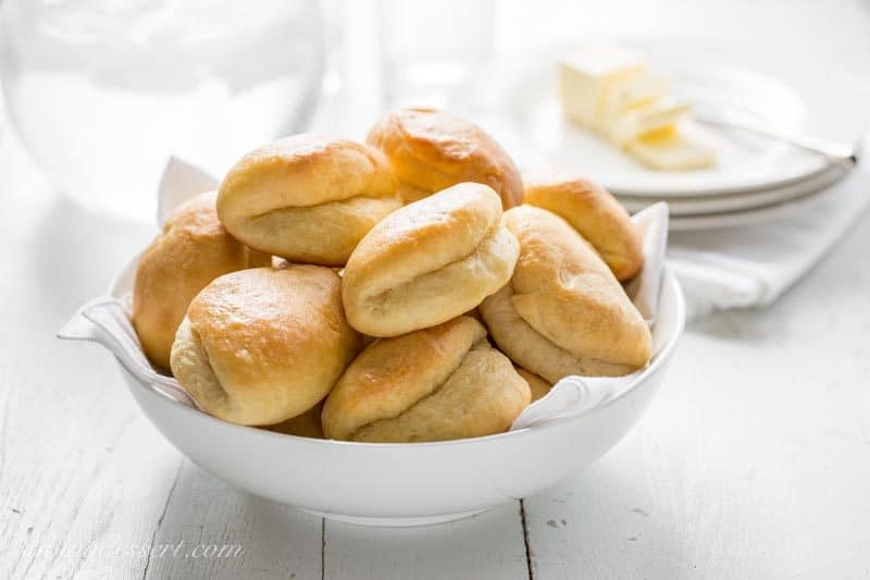 Homemade Parker House Rolls ~ Puffy, pillowy soft and buttery, homemade Parker House Rolls are easy to make and even easier to eat! www.savingdessert.com #savingroomfordessert #parkerhouserolls #homemaderolls #yeastrolls #rolls #dinnerrolls