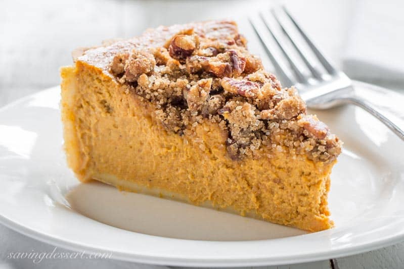 Pumpkin Tart with Pecan Crumble ~ a surprisingly unique and delicious tart with a cream cheese pumpkin base and a sweet, crunchy crumble top loaded with toasted pecans. www.savingdessert.com #pumpkin #pumpkintart #pumpkinpie #Thanksgivingdessert #thanksgiving