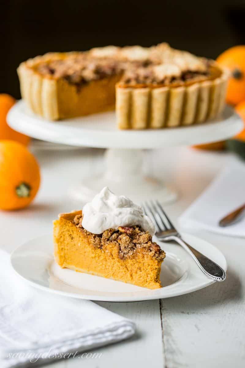 Pumpkin Tart with Pecan Crumble ~ a surprisingly unique and delicious tart with a cream cheese pumpkin base and a sweet, crunchy crumble top loaded with toasted pecans. www.savingdessert.com #pumpkin #pumpkintart #pumpkinpie #Thanksgivingdessert #thanksgiving
