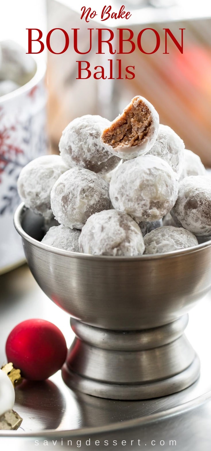 A stack of powdered sugar coated bourbon balls