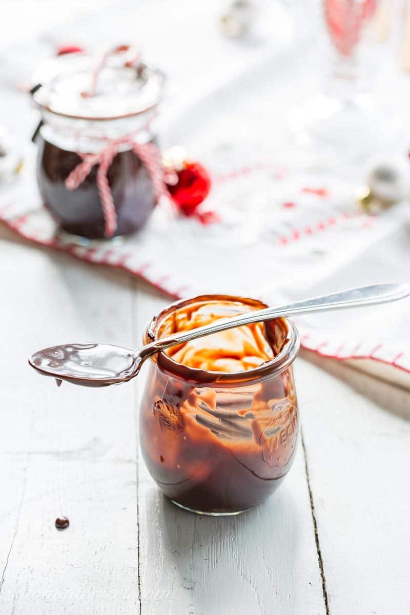 Chocolate Peppermint Sauce ~ a silky smooth, rich all-purpose chocolate sauce with bright peppermint flavor that may be the highlight of your holiday dessert table. Easy to make and perfect served on ice cream, stirred in warm milk for a fantastic hot chocolate, drizzled on cookies or cake or as a dip for fruit. Perfect for gifting too! www.savingdessert.com #savingroomfordessert #chocolate #chocolatesauce #peppermint #dessert