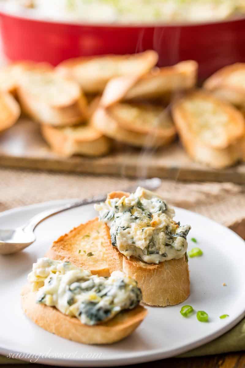 Hot Spinach and Artichoke Dip on toasted baguette slices