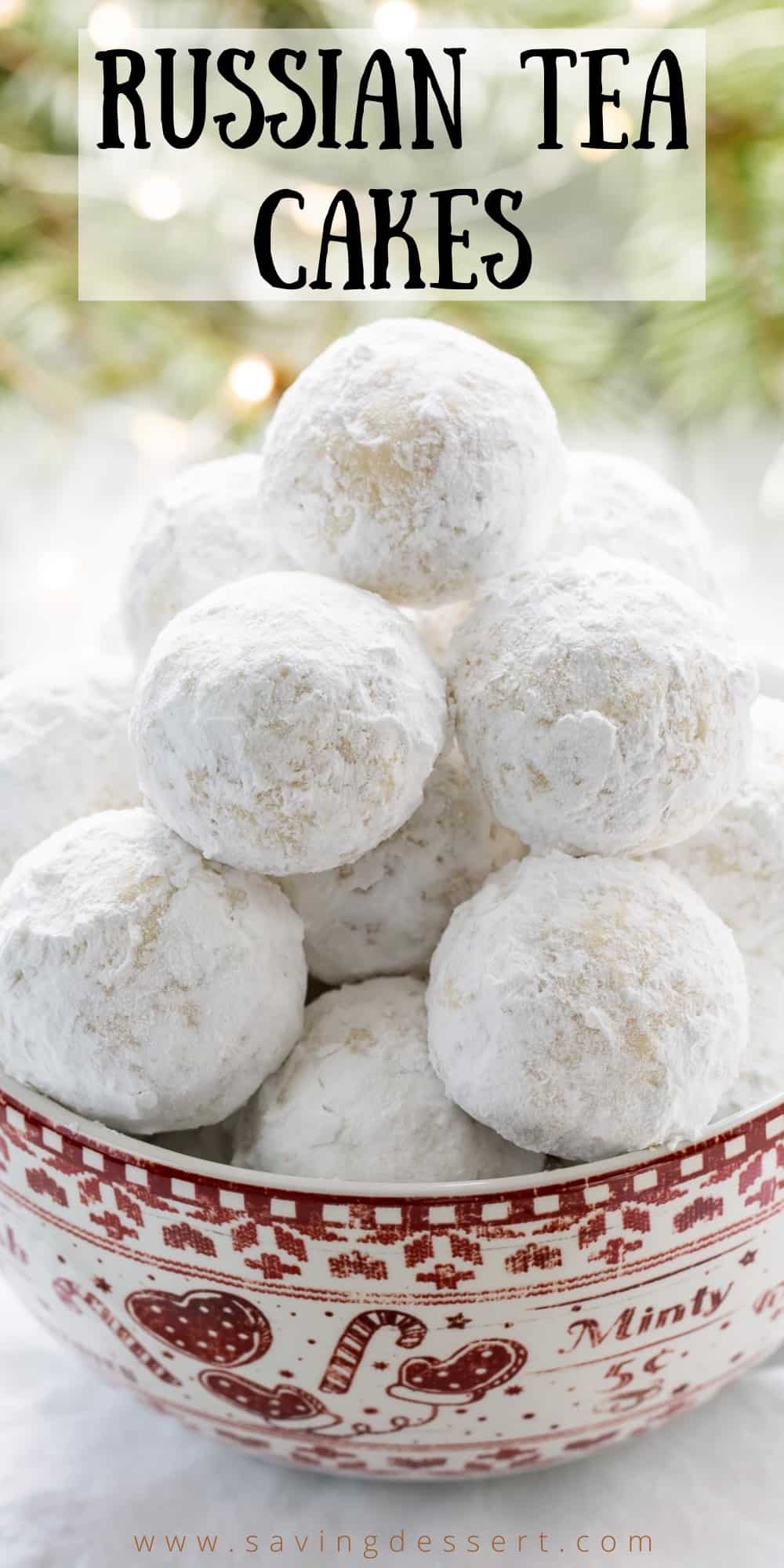A holiday bowl filled with powdered sugar covered cookies