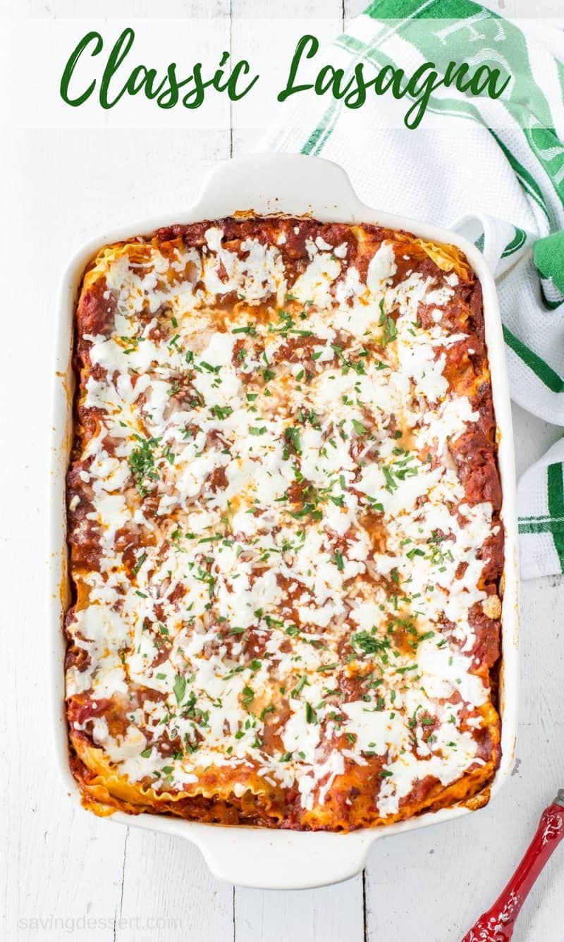 A big pan of classic rich, meaty & cheesy lasagna from Savingdessert.com