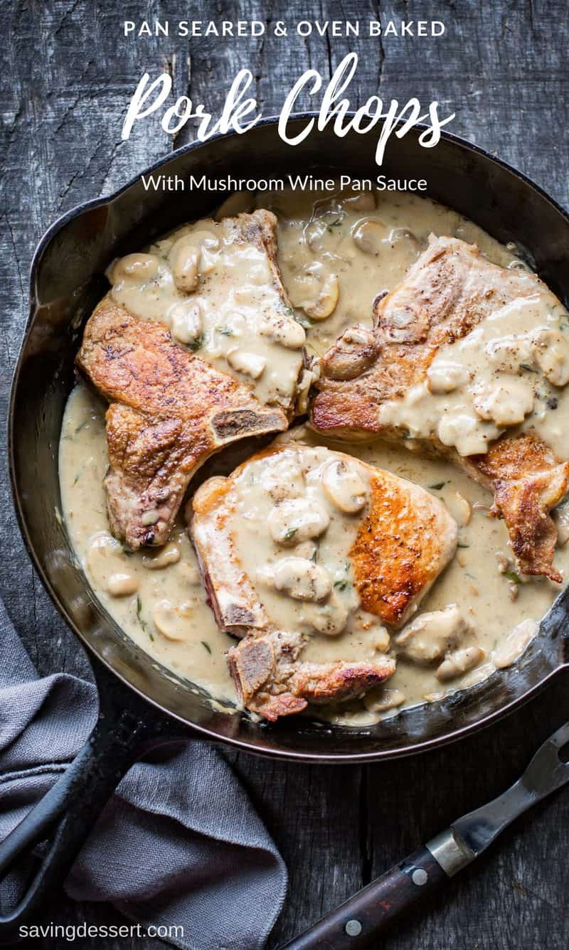 Pan seared, oven baked Pork Chops with Mushroom Wine Pan Sauce - amazing comfort food! Tender, juicy and deliciously thick, our flavorful chops are a real treat, especially when topped with this thyme infused pan sauce made with garlic, mushrooms, shallots, chicken broth and a nice dry white wine. www.savingdessert.com #savingroomfordessert #porkchops #mushroomwinesauce #mushroomgravy #porkchopsgravy #comfortfood #easydinner #castironskillet