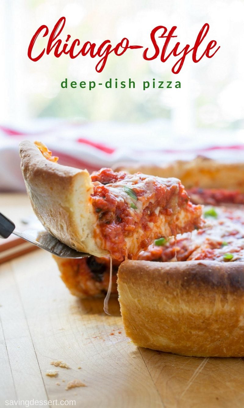 A slice of deep-dish pizza on a spatula with dripping cheese