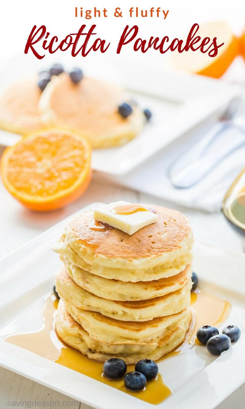 Light & fluffy Ricotta Pancakes with hints of lemon and a fantastic texture to soak up a little syrup. Serve with your favorite fresh fruit for a delightful and delicious way to start the day! www.savingdessert.com #savingroomfordessert #pancakes #ricotta #ricottapancakes #easypancakes #breakfast #brunch #mothersday #weekend