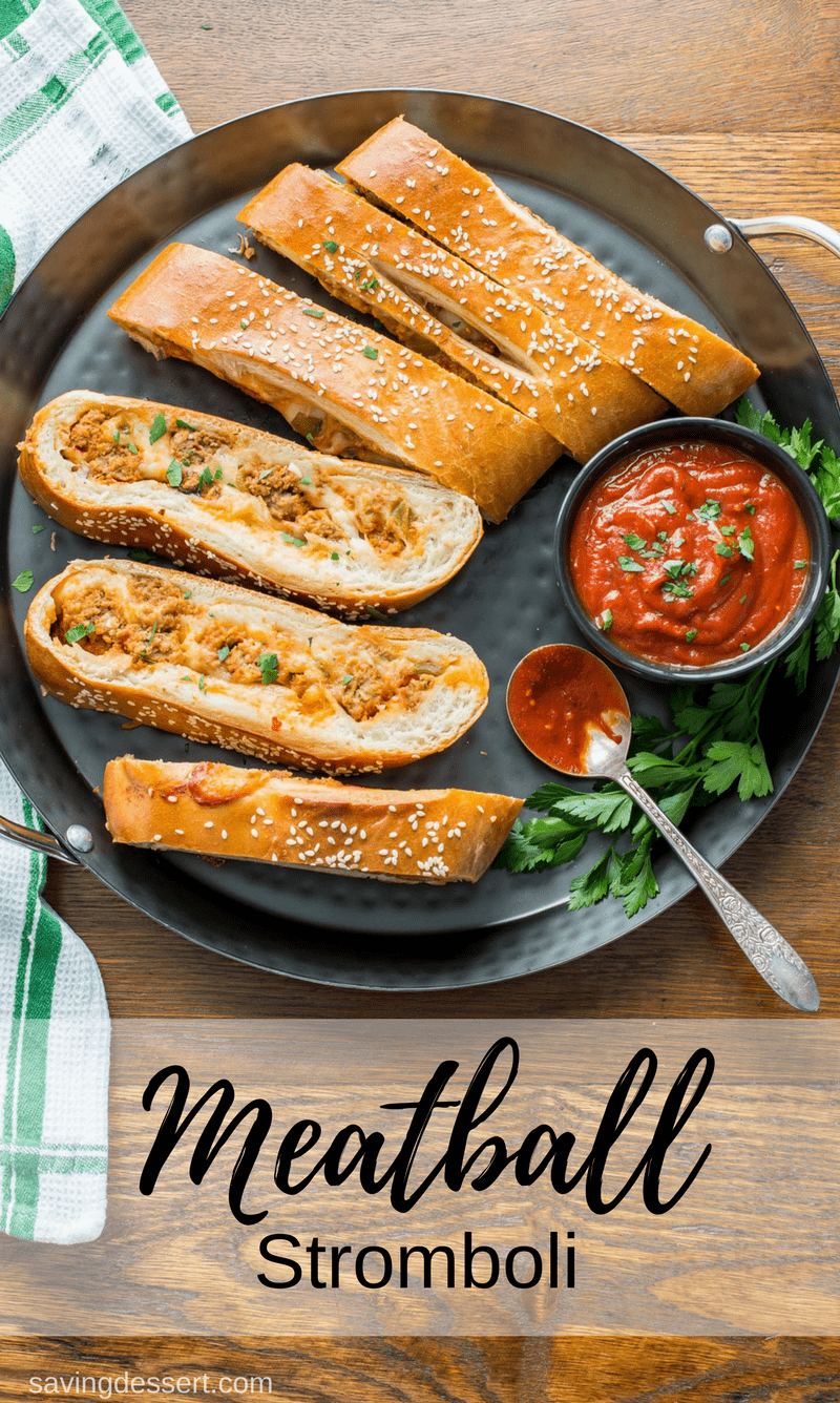 Enjoy this Cheesy Meatball Stromboli Recipe made with store-bought pizza dough, two kinds of cheese, frozen meatballs and jarred pizza sauce for a delicious and hearty fresh-baked Italian-American experience. #savingroomfordessert #meatball #italianmeatball #stromboli #pizzadough #dinner #italiandinner #meatballstromboli