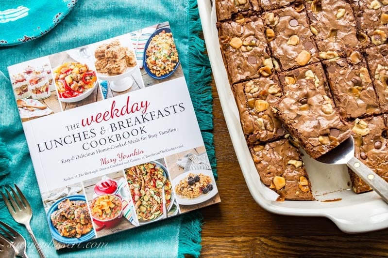 The Weekday Lunches & Breakfasts Cookbook and a pan a brownies