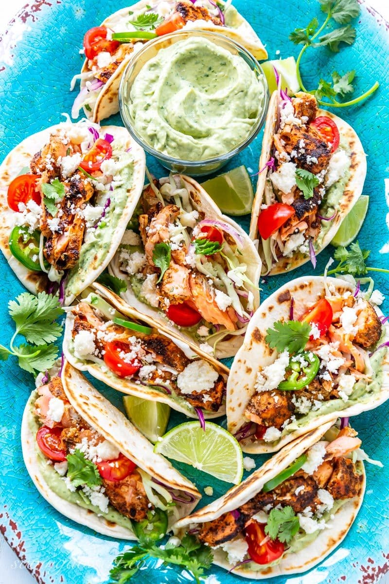 A platter of grilled salmon tacos