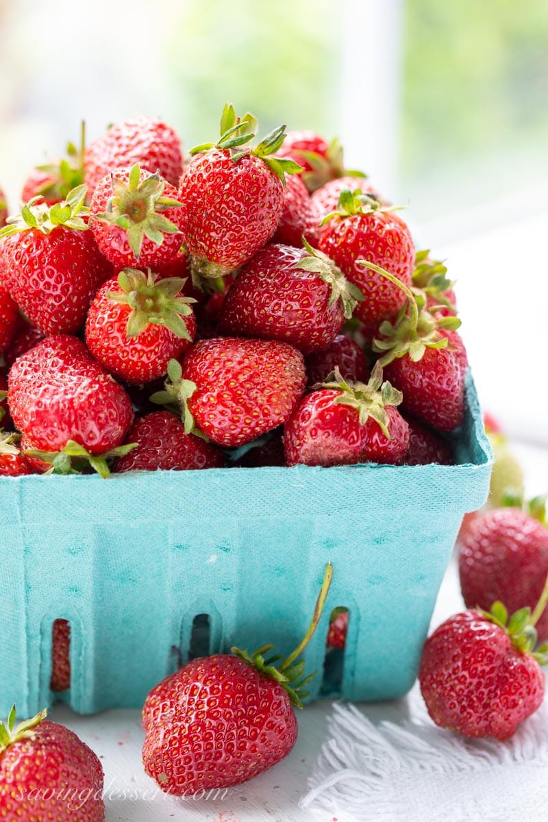 Fresh picked strawberries in a container