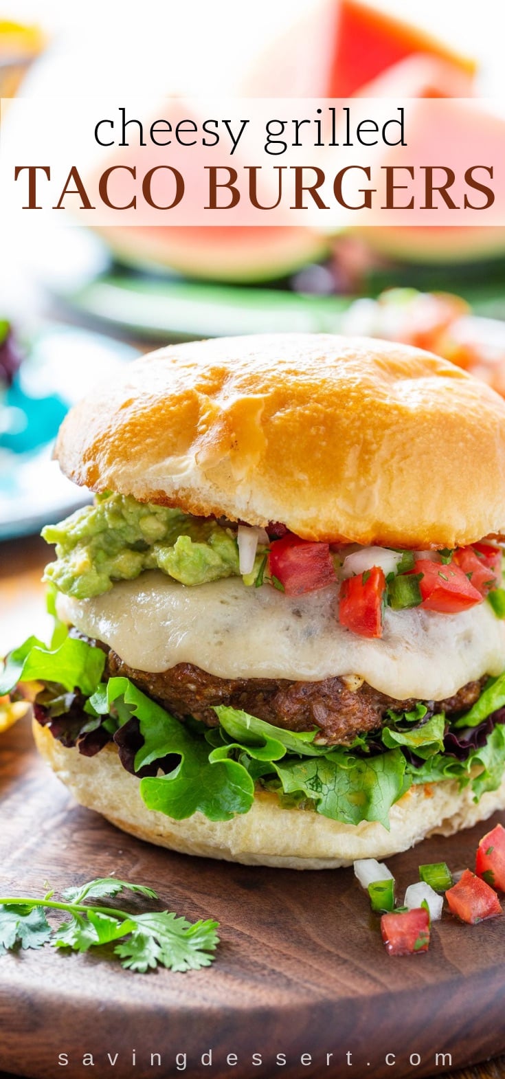 Cheesy Grilled Taco Burgers - all the Mexican flavors you love, in one tasty burger! #burger #taco #tacotuesday #grilledburger #hamburger #mexicanburger #cheeseburger #tacoburger #mexican