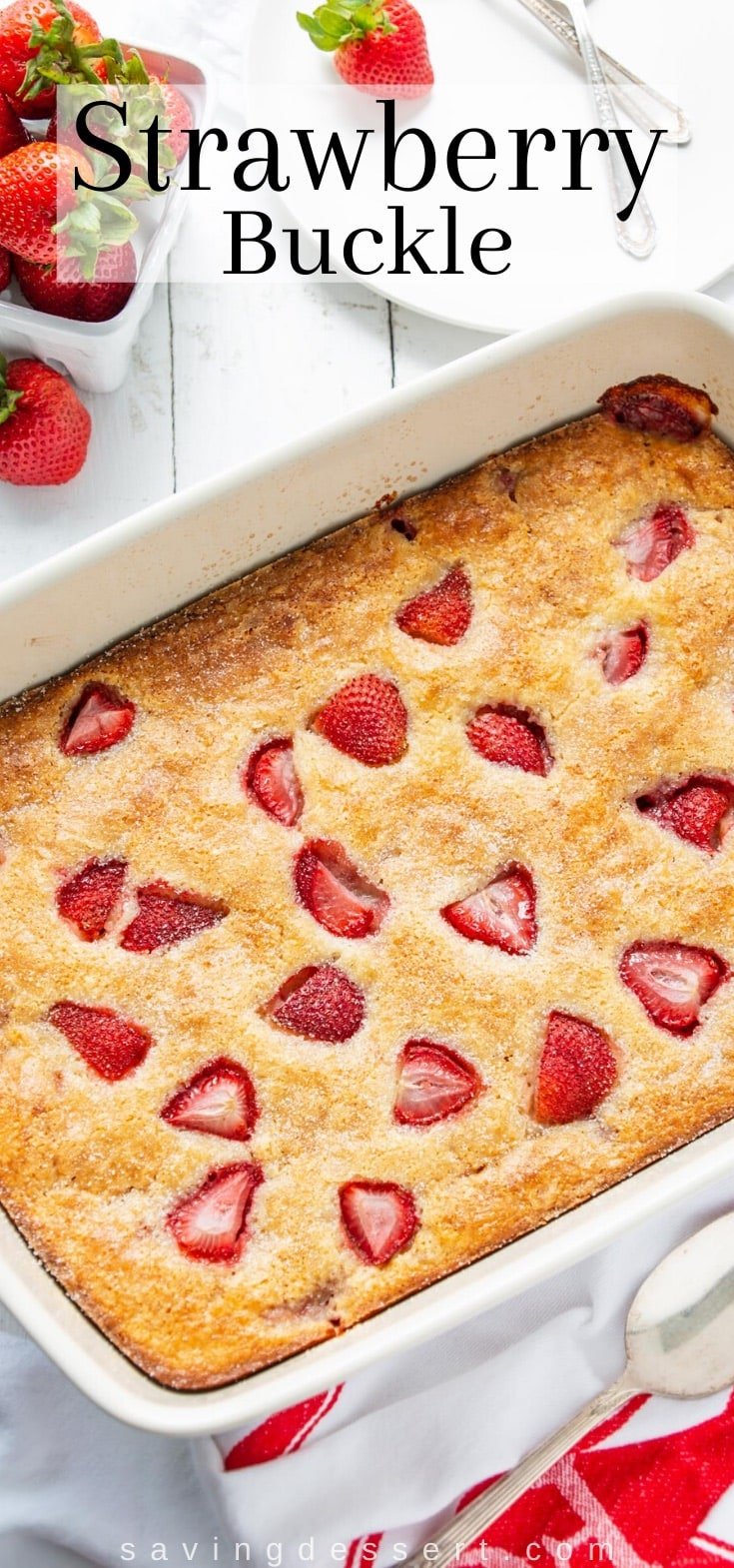 An overhead view of a strawberry buckle with strawberries on top