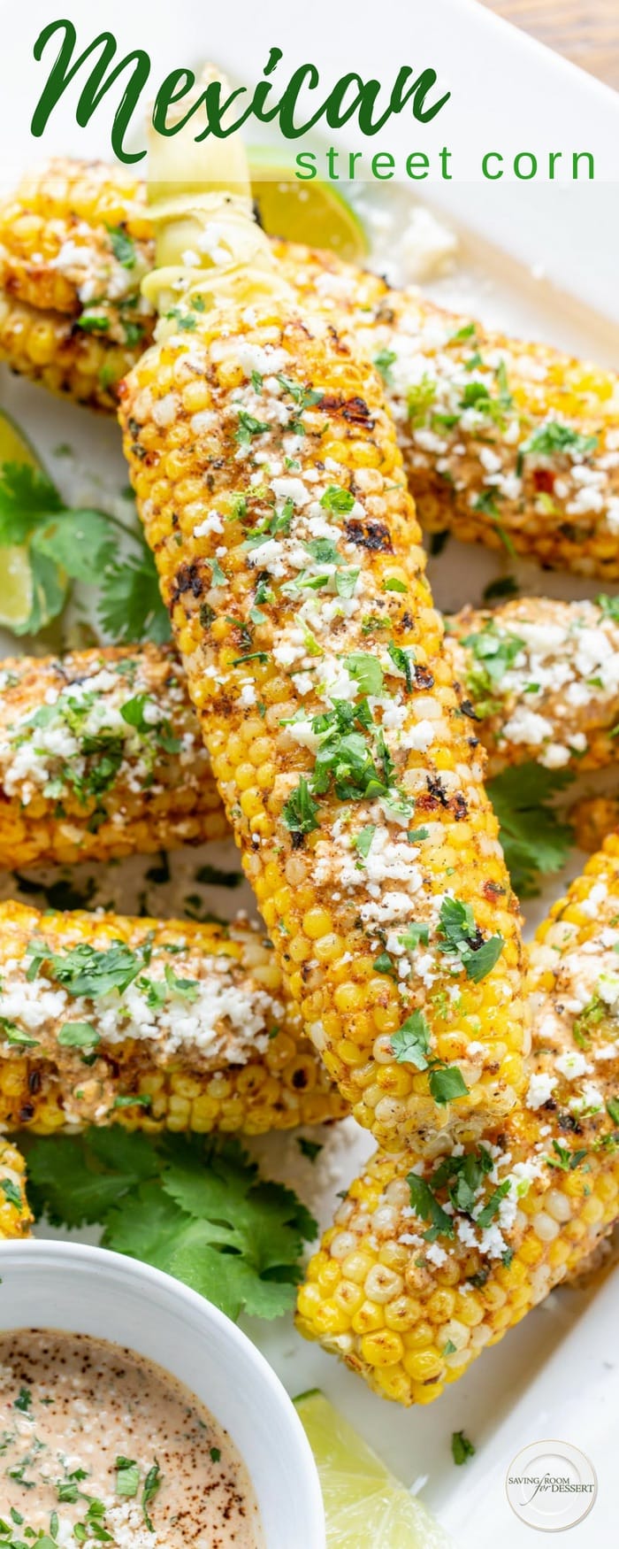 Grilled Mexican Street Corn (Elote) - a wonderfully messy, well spiced, delicious summer treat! Sweet summer corn is slathered in a mixture of mayonnaise, garlic, lime juice, chili powder and Cotija cheese then grilled to perfection. #streetcorn #grilled #grilledcorn #corn #mexicanstreetcorn #mexican #summercorn #vegetable #grilledvegetable