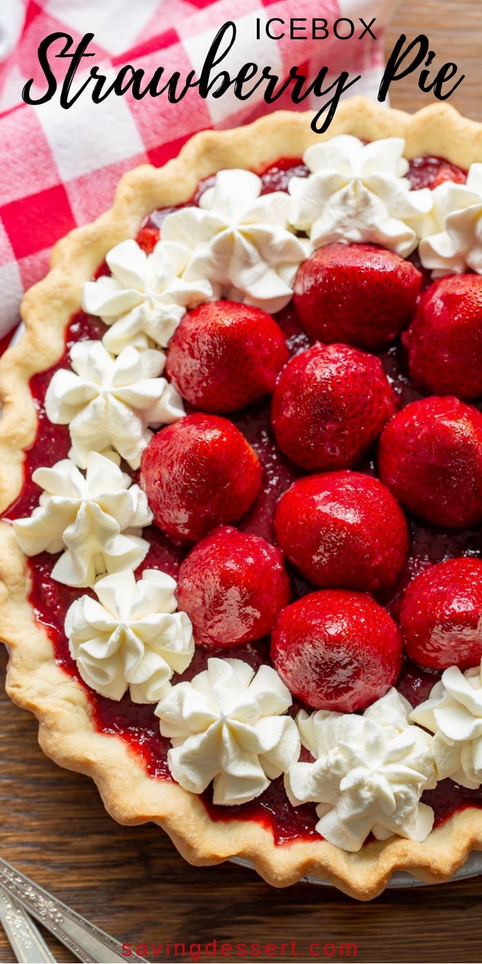 Icebox Strawberry Pie made with plenty of ripe strawberries scooped into a flaky pre-baked pie crust, then topped with lightly sweet whipped cream cheese. #savingroomfordessert #strawberry #strawberrypie #pie #summerpie #iceboxpie #iceboxstrawberrypie