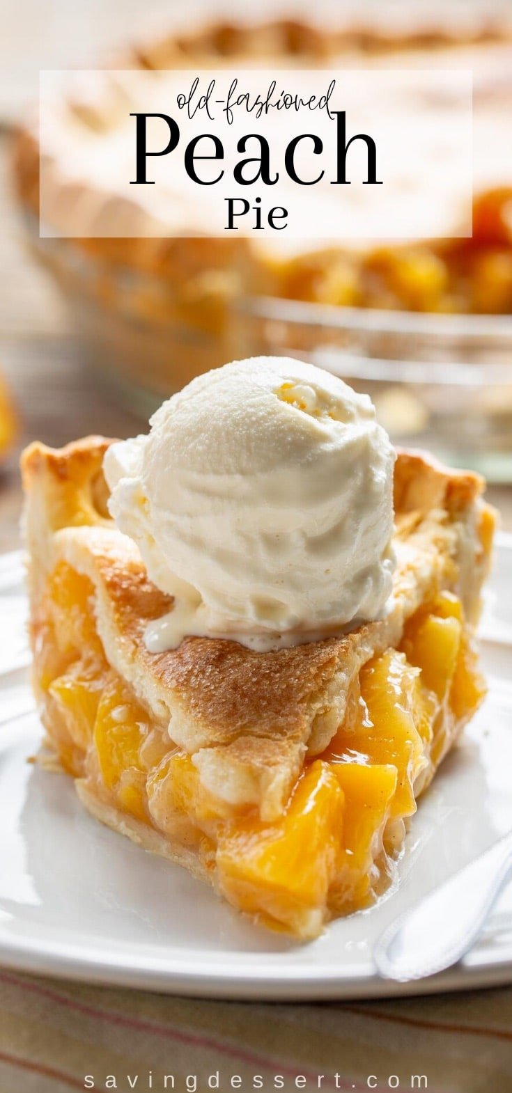 a slice of fresh peach pie topped with a scoop of vanilla ice cream