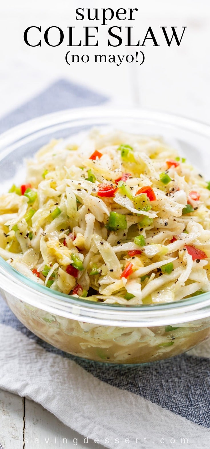 a bowl of mayo-free cabbage cole slaw with pimentos and green bell pepper