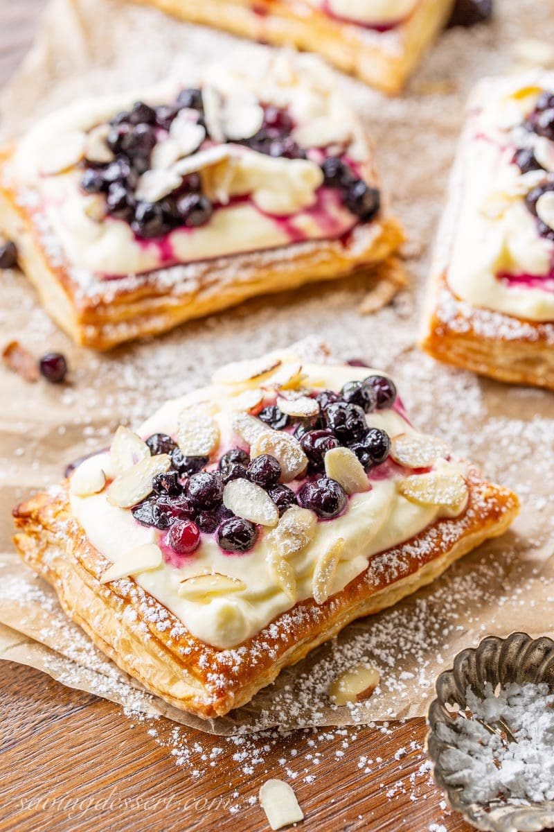 Blueberry Puff Pastry Tarts with Lemon Cream, toasted almonds and powdered sugar