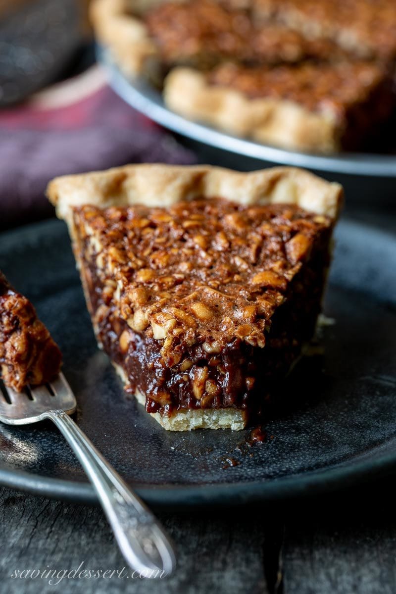 a slice of chocolate peanut pie with a fork