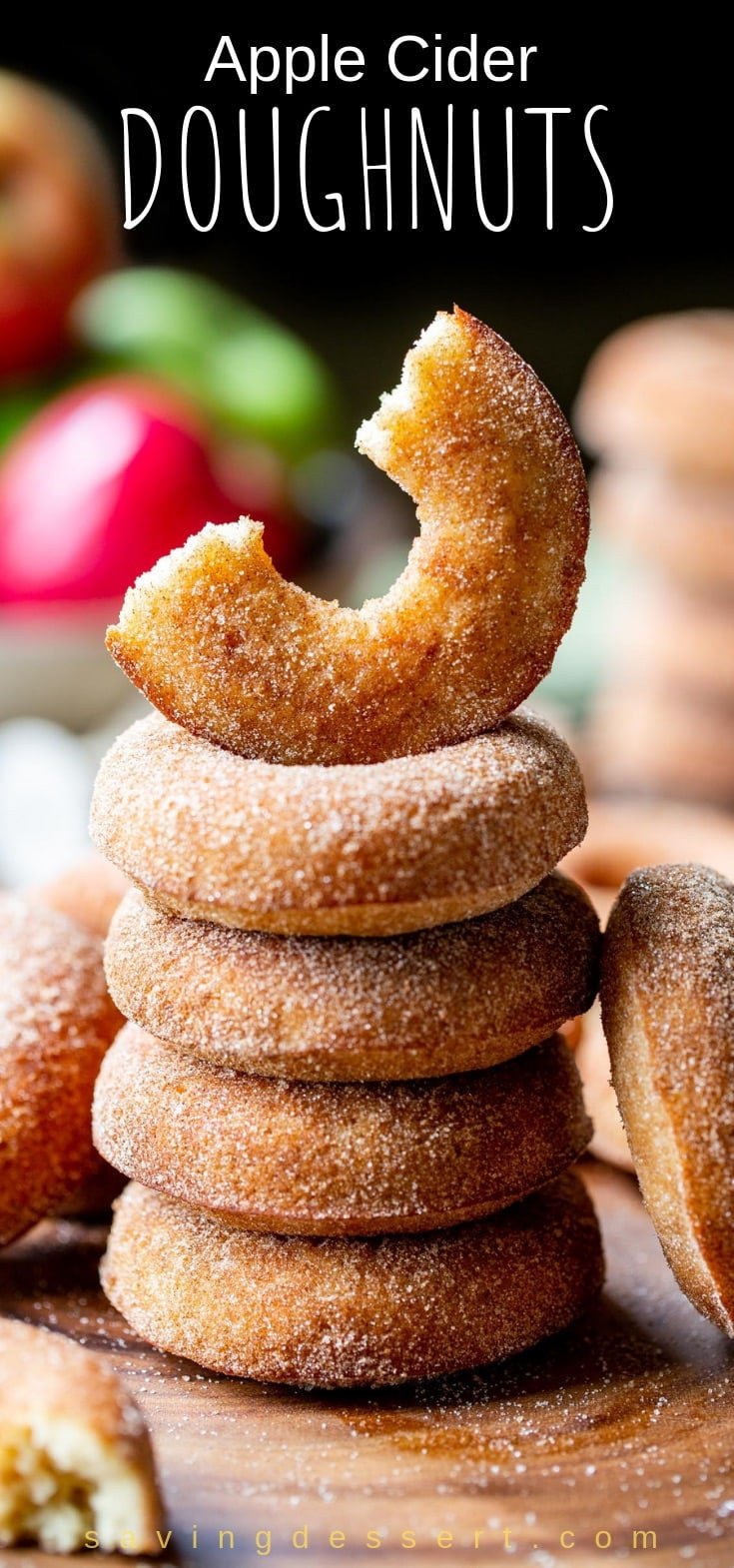 A stack of apple cider doughnuts coated in cinnamon sugar