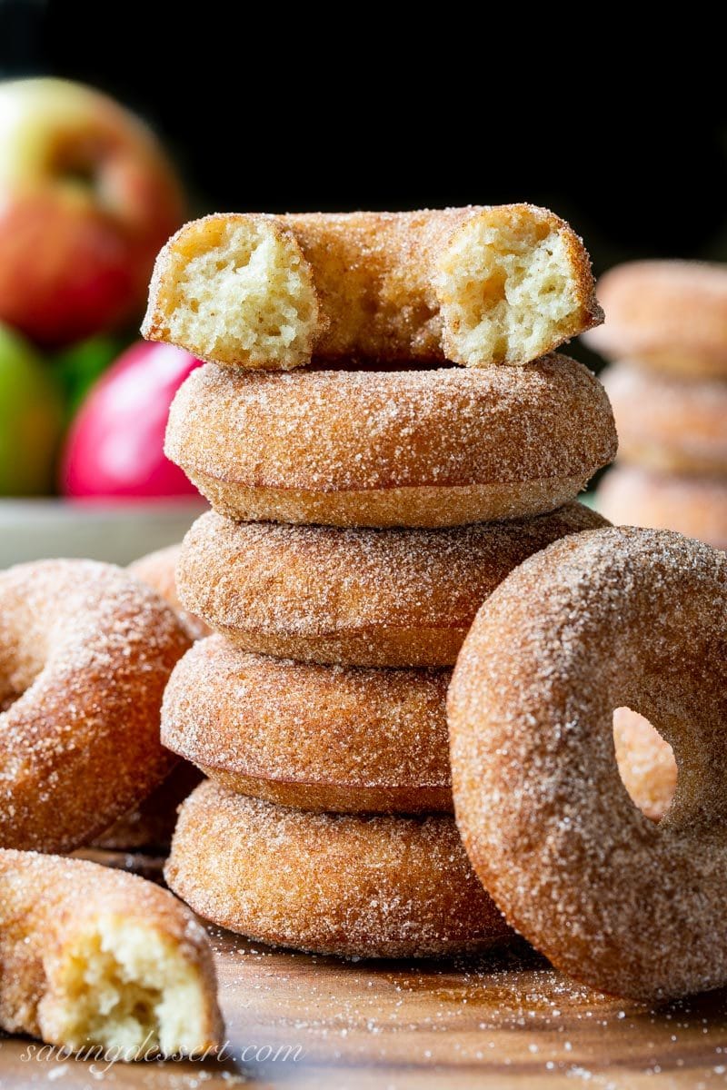 A stack of cinnamon sugar coated baked apple cider doughnuts