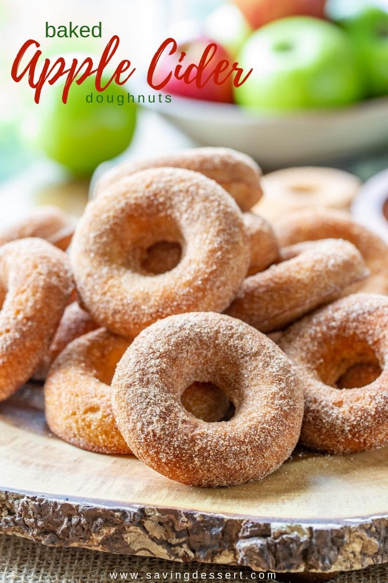 Baked Apple Cider Doughnuts - these light and spongy cinnamon sugar coated Apple Cider Doughnuts are so delicious, bet you can't eat just one! #savingroomfordessert #donuts #doughnuts #appleciderdoughnuts #appleciderdonuts #applecider #bakeddoughnuts #bakeddonuts