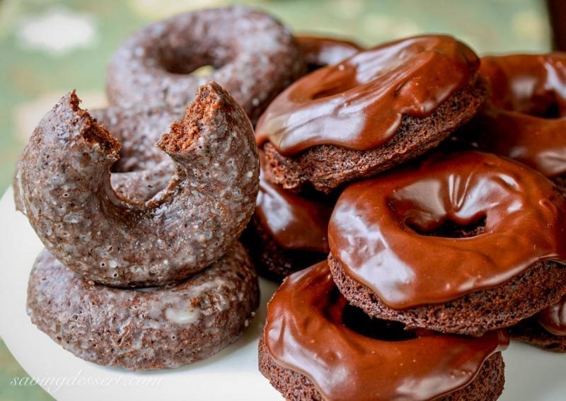 Chocolate cake doughnuts with a buttermilk glaze or velvety chocolate icing