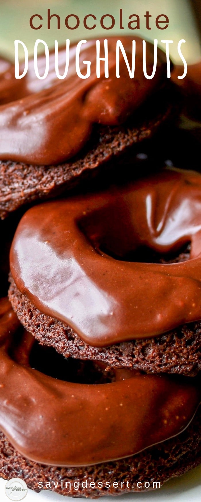 Baked Chocolate Doughnuts - rich and luscious and completely delicious, we adore these soft little, tender cakey doughnuts with the velvety chocolate icing or simple sweet buttermilk glaze! #savingroomfordessert #doughnuts #chocolatedoughnuts #donuts #chocolatedonut #bakeddonuts #bakeddoughnuts 