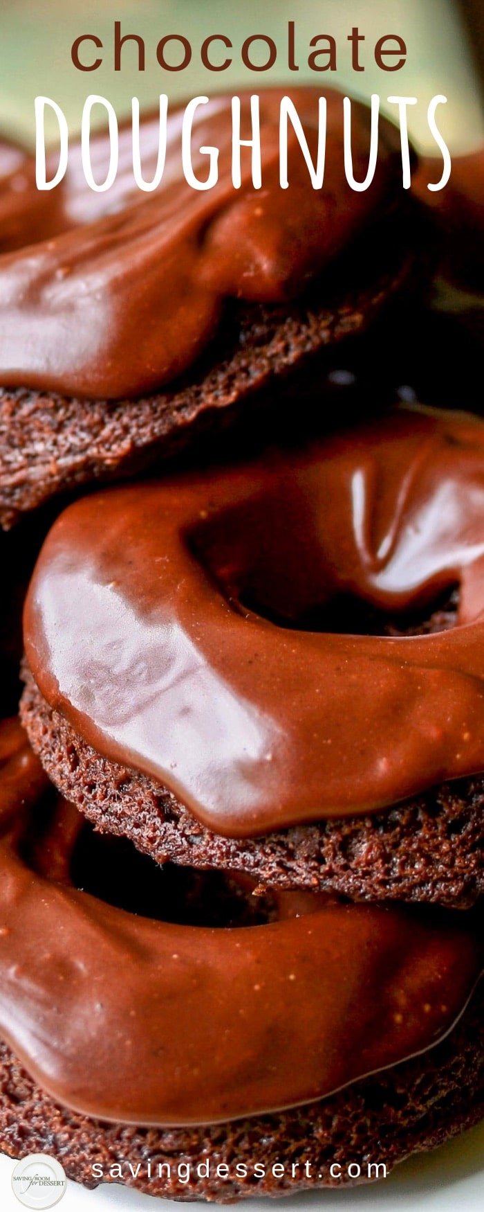 Baked Chocolate Doughnuts - rich and luscious and completely delicious, we adore these soft little, tender cakey doughnuts with the velvety chocolate icing or simple sweet buttermilk glaze! #savingroomfordessert #doughnuts #chocolatedoughnuts #donuts #chocolatedonut #bakeddonuts #bakeddoughnuts