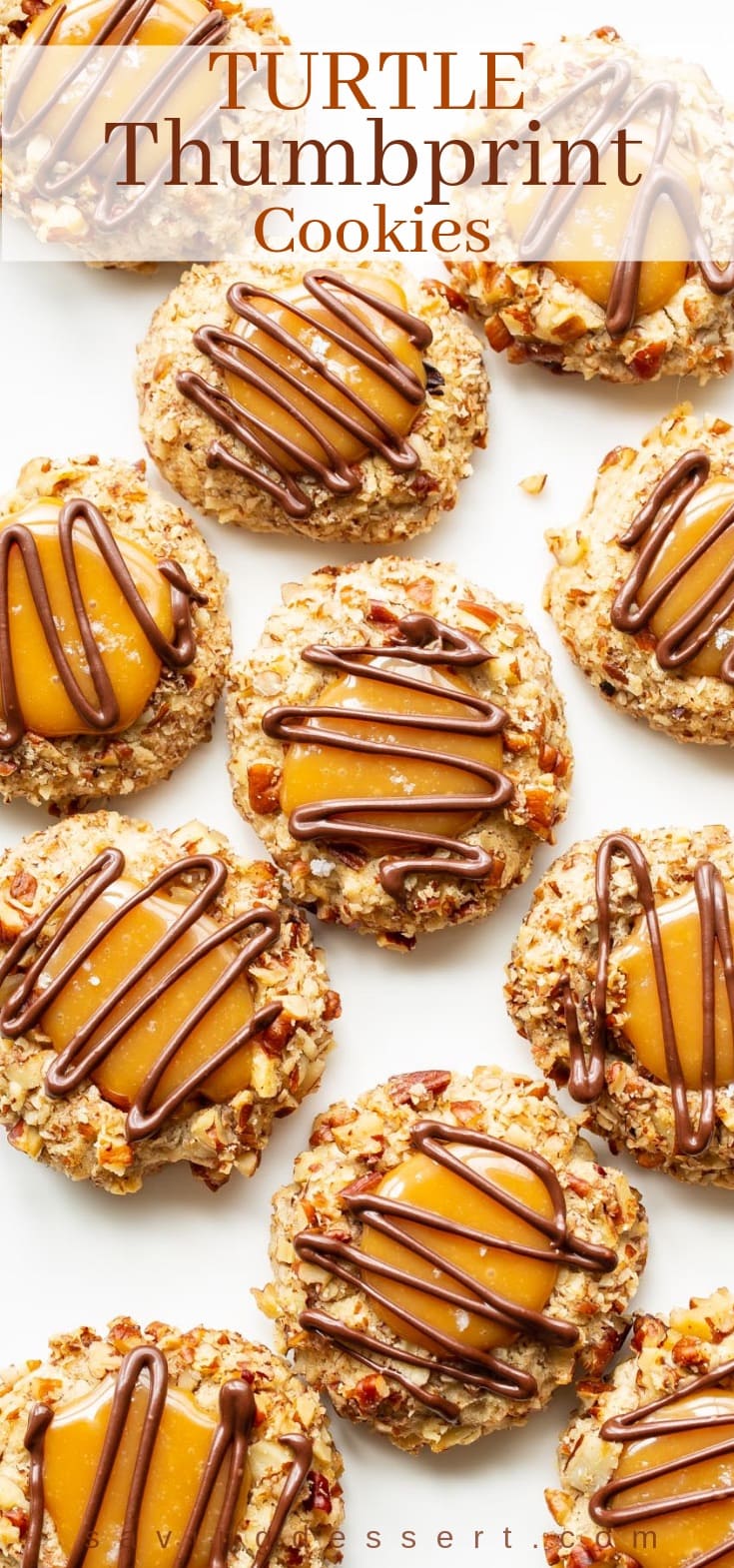A plate of nutty turtle thumbprint cookies drizzled with chocolate