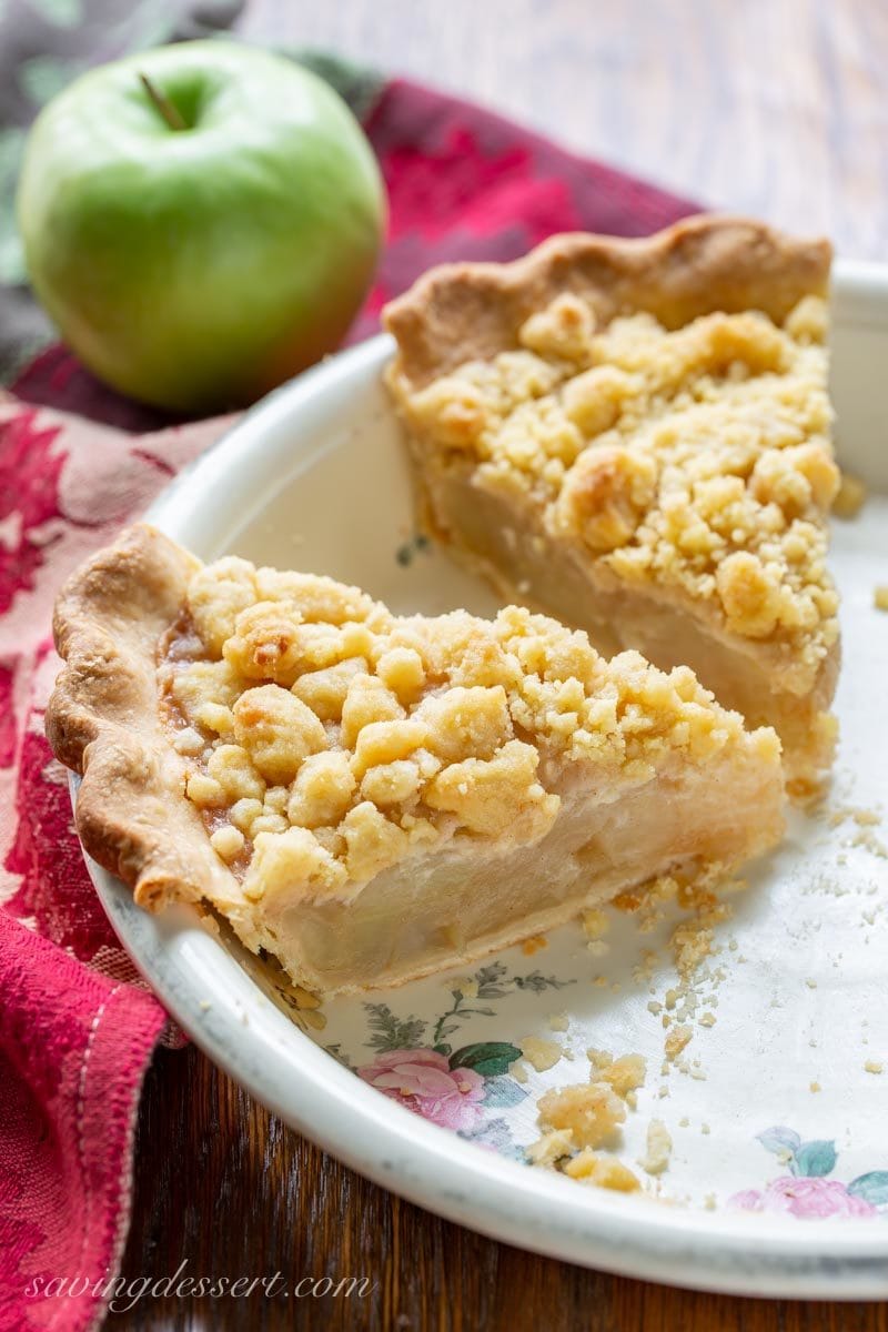 A couple of slices of Dutch Apple Pie with a crumble top