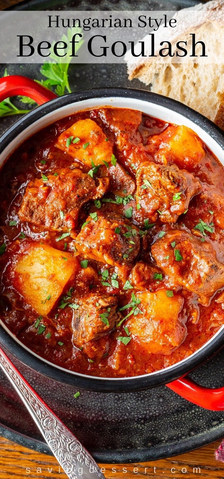 A bowl of Hungarian Beef Goulash garnished with chopped parsley