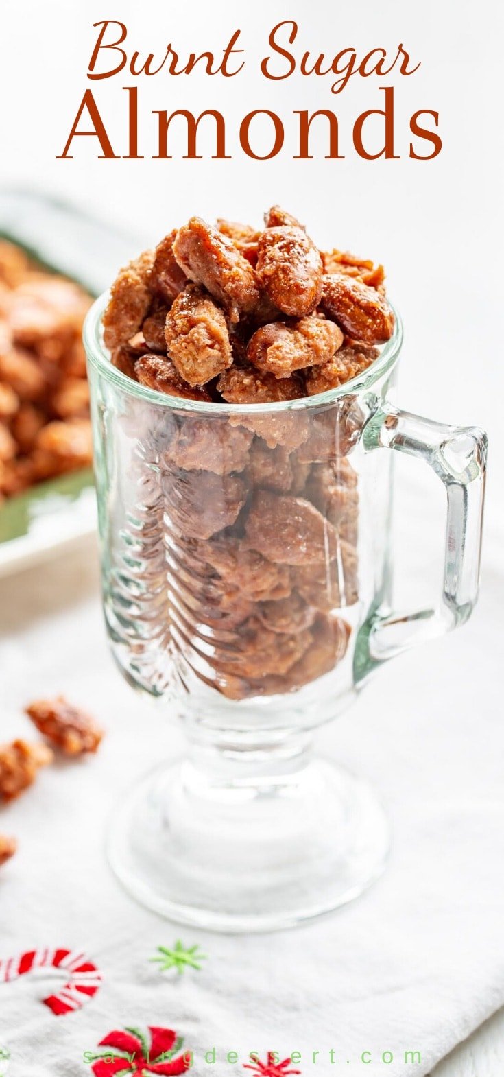 A clear mug of burnt sugar almonds