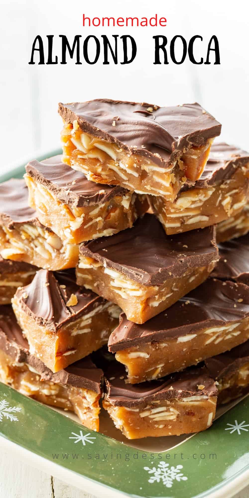 A holiday plate stacked with pieces of chocolate covered homemade almond roca candy