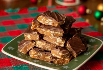 A holiday plate topped with chocolate almond toffee candy