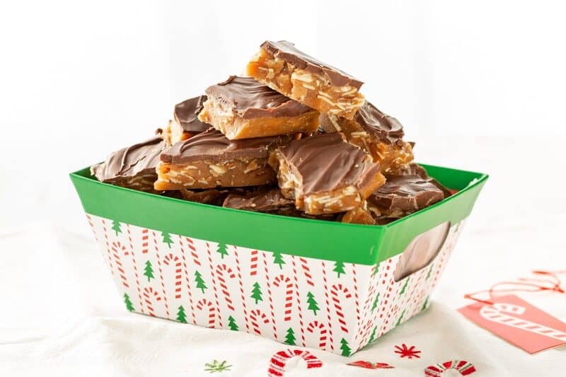 A holiday basket of homemade toffee almond candy covered with chocolate