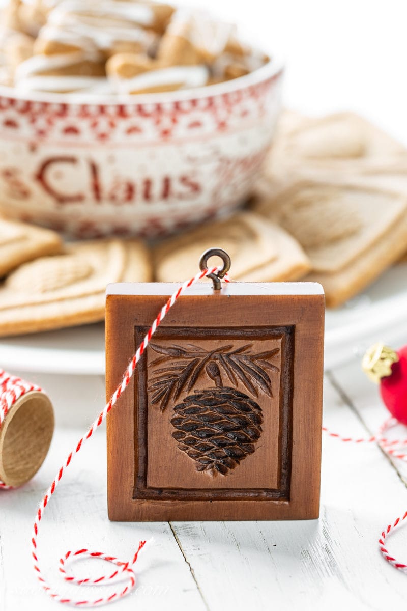 A Springerle mold with a pine cone design to make Speculaas cookies
