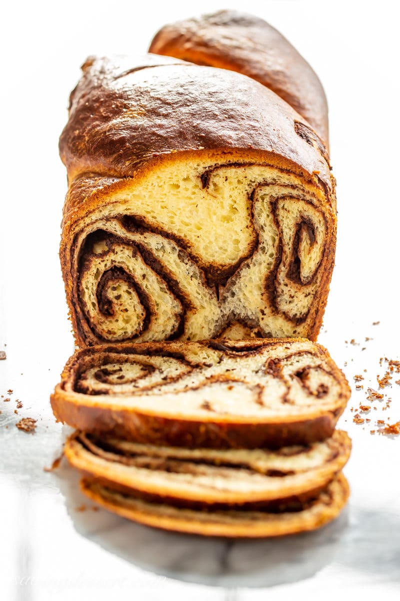 A sliced view of a loaf of chocolate babka