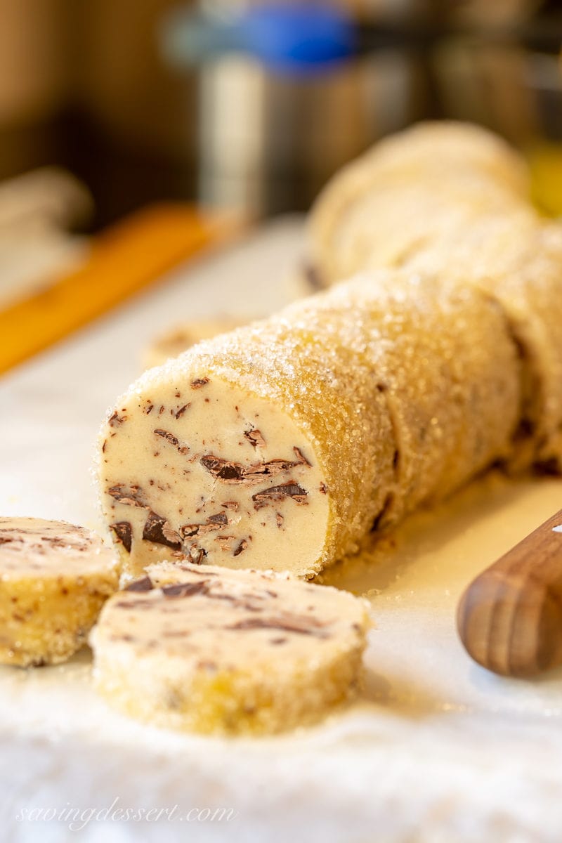 A log of refrigerated cookie dough sliced into rounds