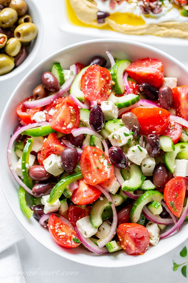 A fresh, crisp Greek Salad with cucumbers, tomatoes, onions, olives and feta cheese