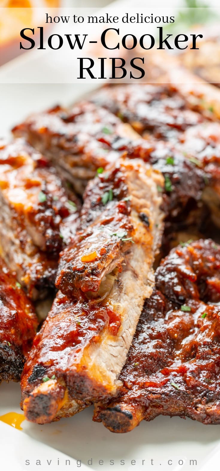 A platter of saucy pork ribs garnished with parsley