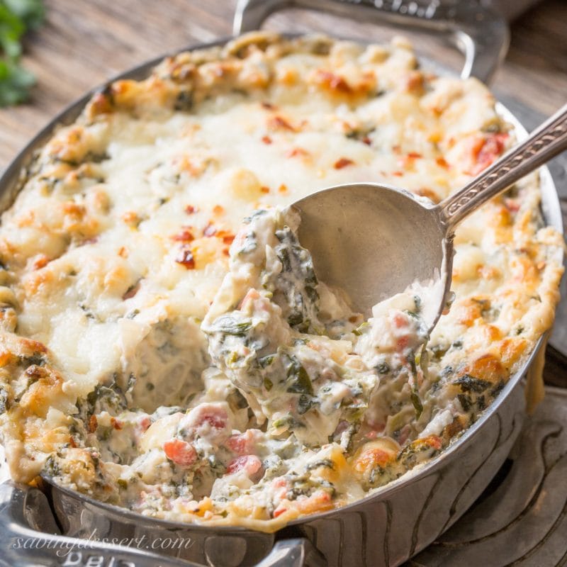 a casserole dish with hot Southwestern Spinach Dip