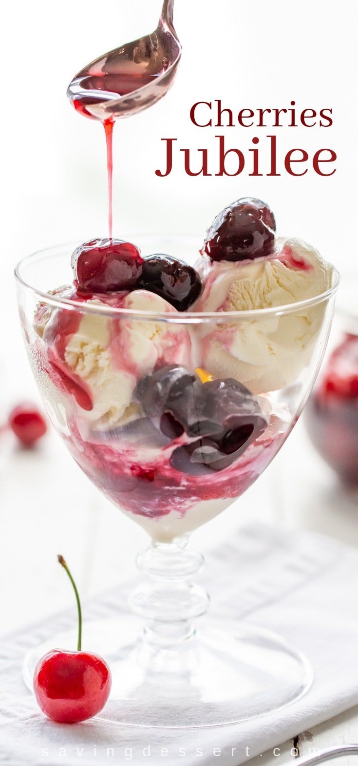 A glass of vanilla ice cream and Cherries Jubilee