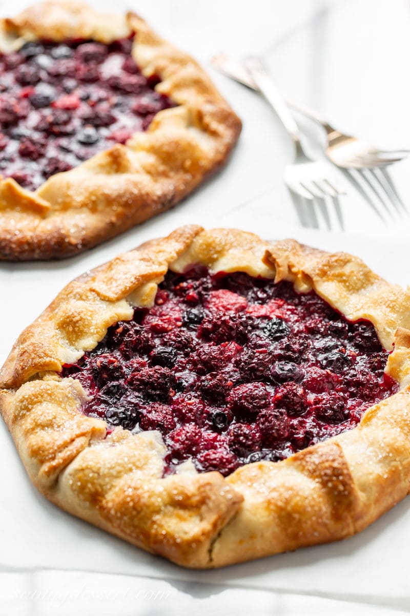 Two small homemade mixed berry crostatas