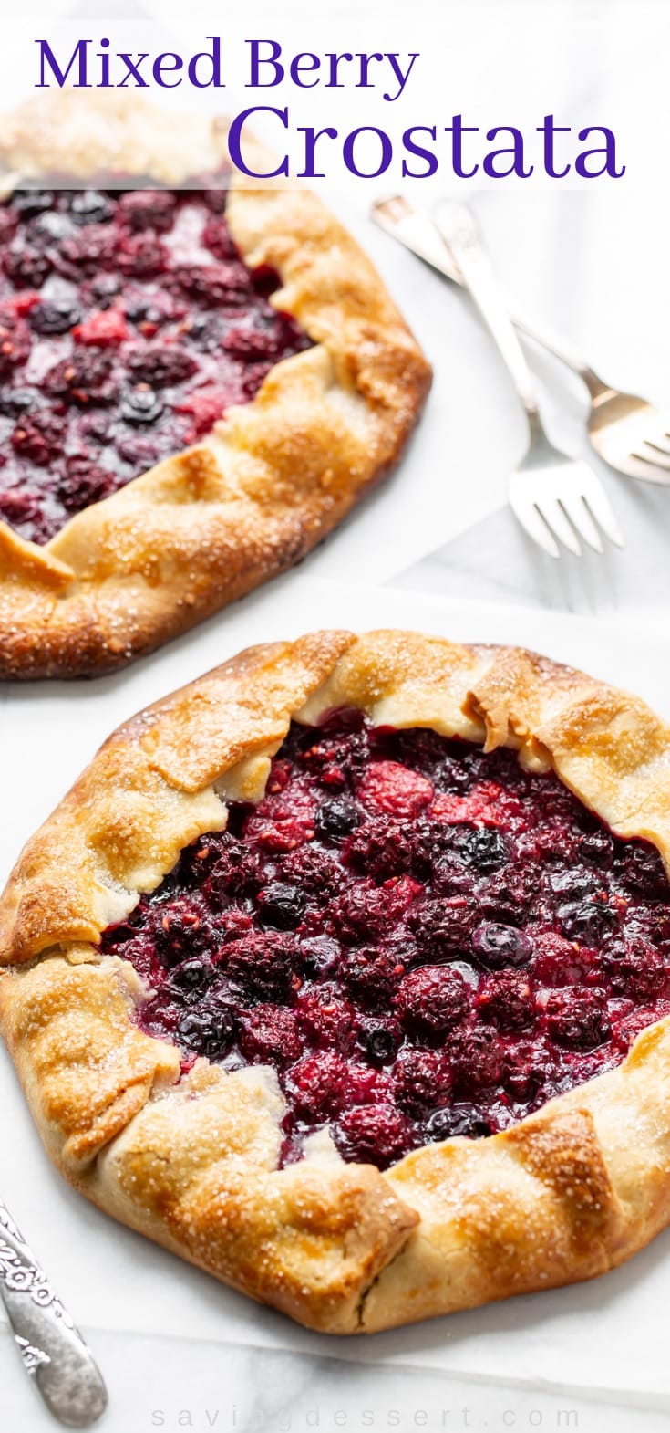 Mixed berry crostatas with raspberries, blueberries and blackberries