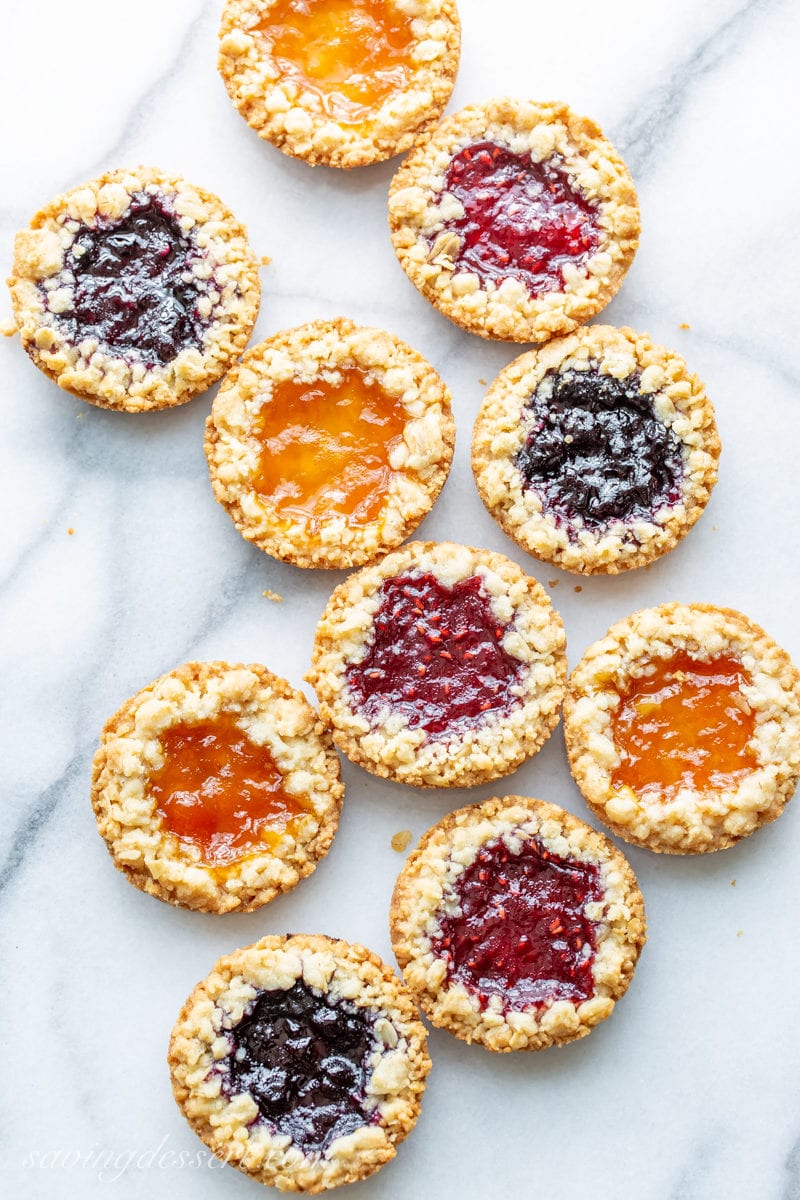 Oatmeal Jammy Cookies filled with apricot, blueberry and raspberry jam