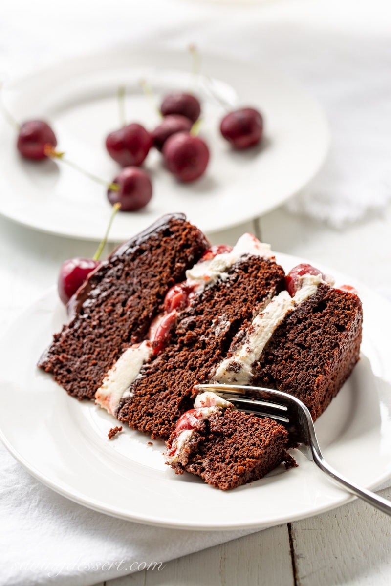A slice of Black Forest Cake with whipped cream filling 