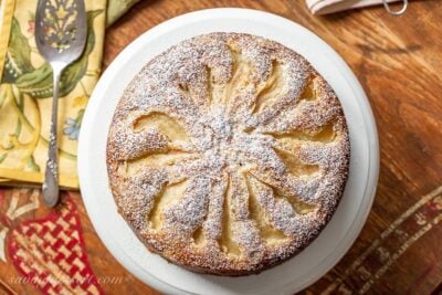 An overhead persuasion of a fresh pear cake dusted amongst powdered saccharide Fresh Pear Cake