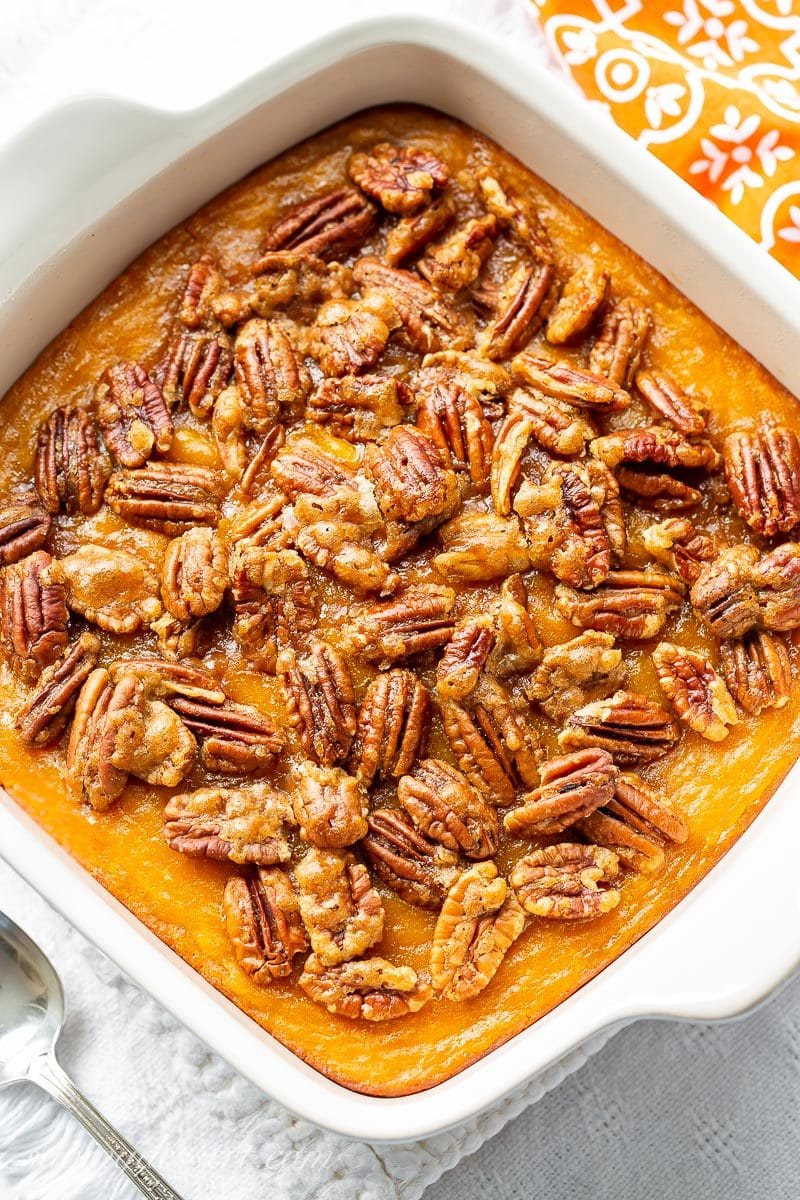 A Butternut Squash Casserole topped with brown sugar cinnamon pecans
